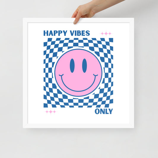 Framed poster with a pink smiley face and 'Happy Vibes Only' text on a checkered background.