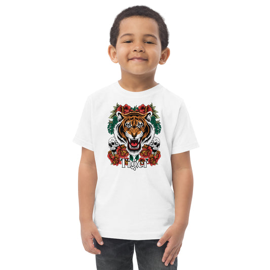 Child wearing a white t-shirt with a tiger graphic design on a white background