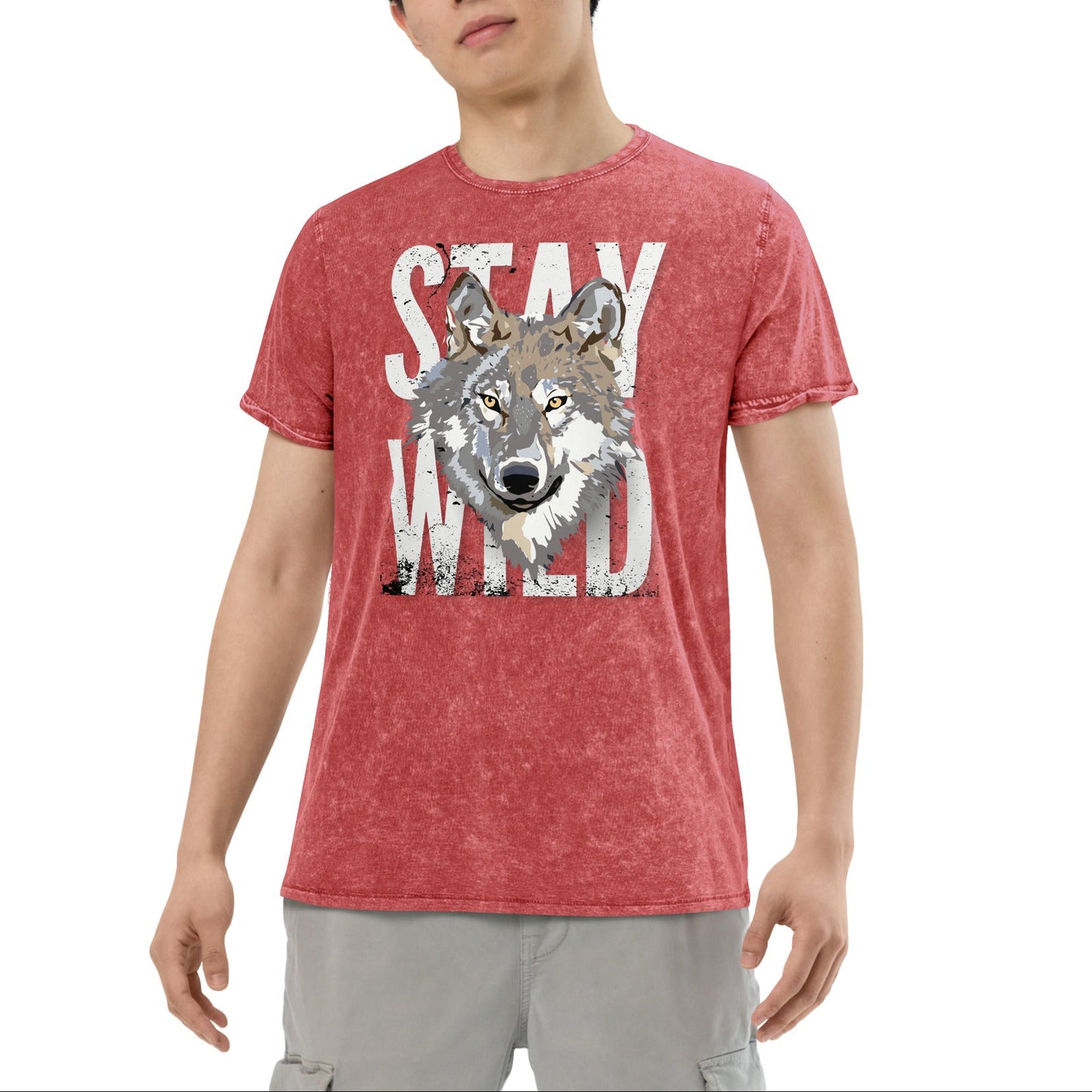 Person wearing a red t-shirt with a wolf graphic and 'Stay Wild' text on a white background