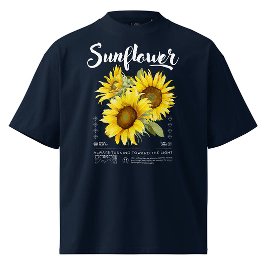 Navy blue t-shirt with sunflower design and text on a white background