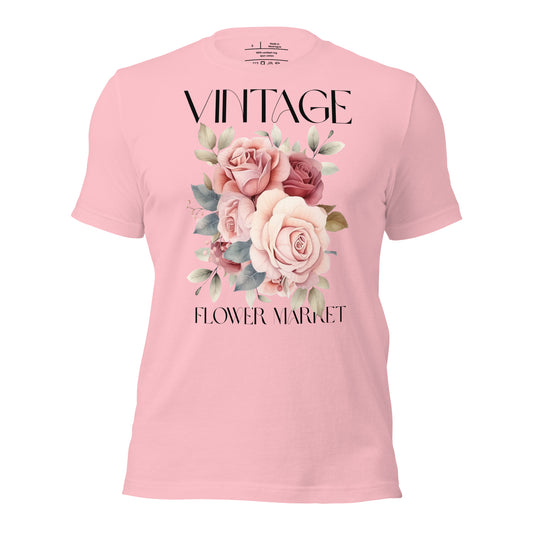 Pink t-shirt with floral design and text on a white background