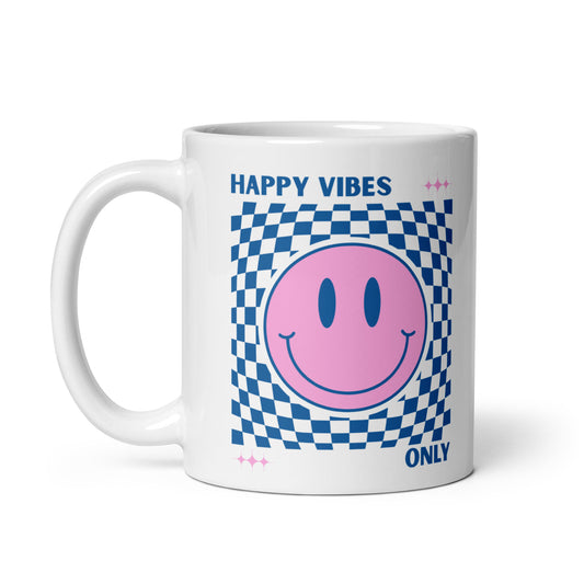 Mug with pink smiley face and 'Happy Vibes Only' text on a white background