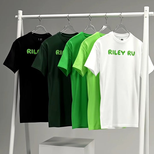 Four t-shirts in black, green, and white on a rack with 'RILEY GU' branding.