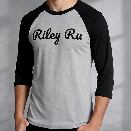 Man wearing a gray and black 'Riley Ru' baseball shirt against a neutral background
