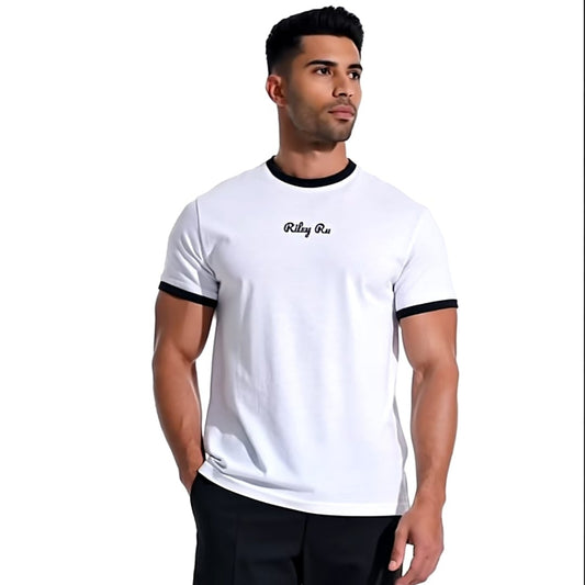 Man wearing a white t-shirt with black trim and black pants on a white background