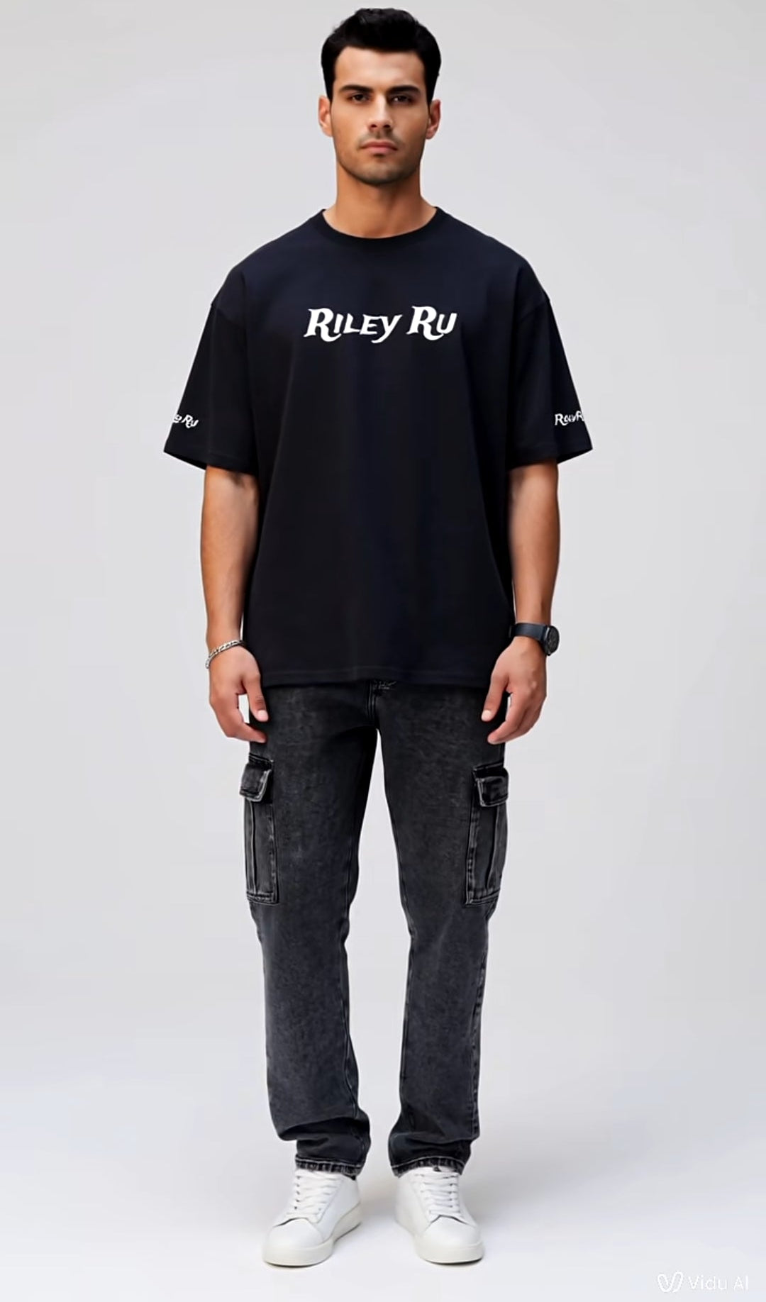 Person wearing a black t-shirt with 'Riley Ru' logo on a white background