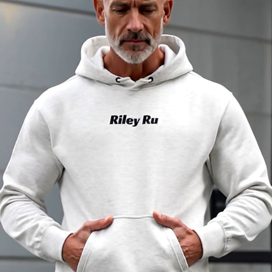 Man wearing a white hoodie with 'Riley Ru' logo against a gray background