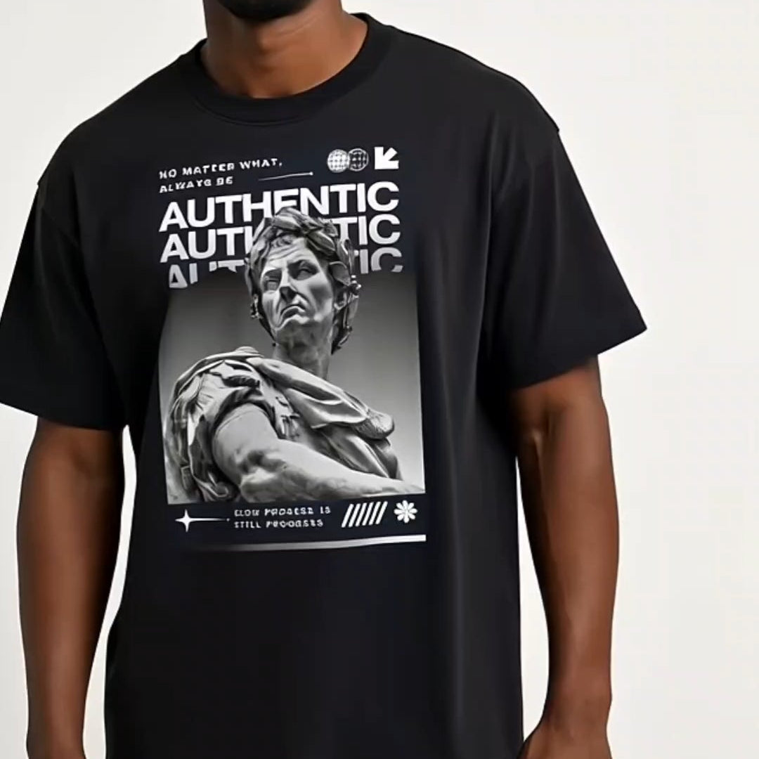 Man wearing a black t-shirt with graphic design on a white background