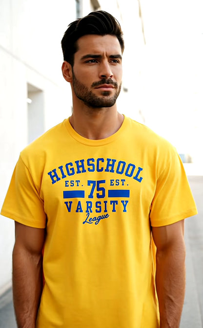 Man wearing a yellow t-shirt with 'Highschool Varsity League' text, standing against a light-colored wall.