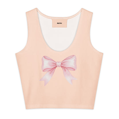 Pink tank top with a large bow design on a white background