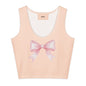 Pink tank top with a large bow design on a white background