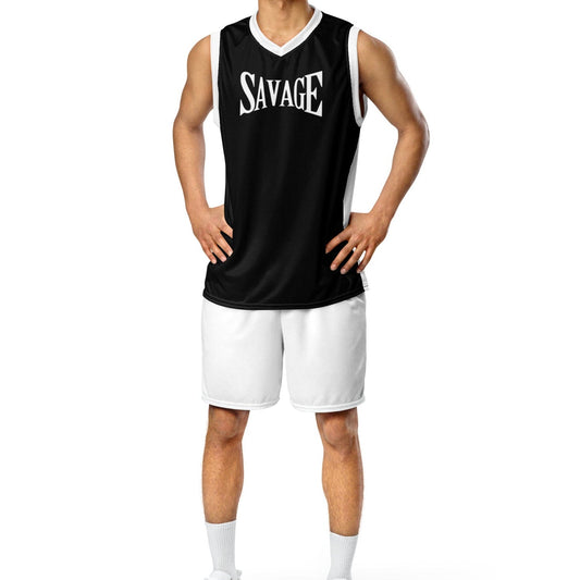 Person wearing a black sleeveless shirt with 'SAVAGE' printed on it, white shorts, and white sneakers on a white background.