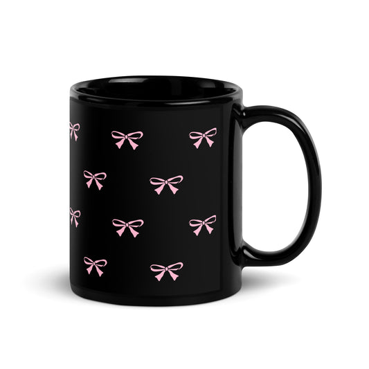 Black mug with a logo on a white background