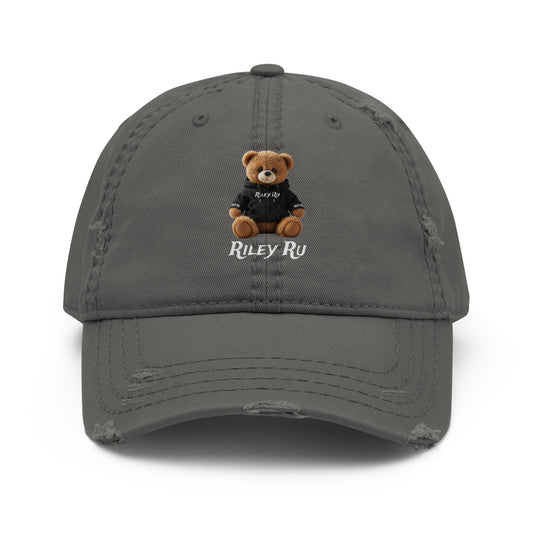 Gray cap with a teddy bear and 'Riley Ru' logo on a white background