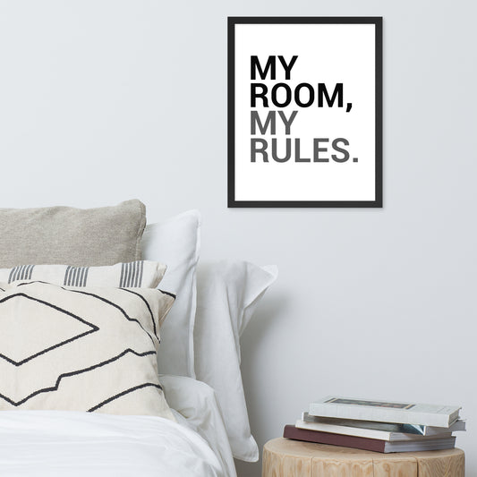 Framed poster with 'My Room, My Rules' text above a bed with pillows and books on a nightstand.