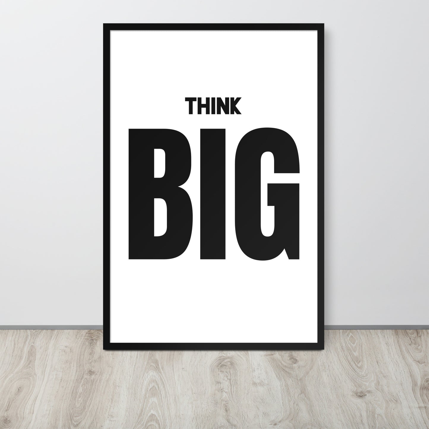 Framed poster with 'Think Big' text on a white background
