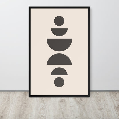 Framed abstract art print with geometric shapes on a beige background