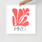 Framed artwork with red abstract design and 'ART' text on a white background