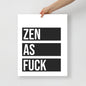 Poster with 'ZEN AS FUCK' text held by a hand on a white background