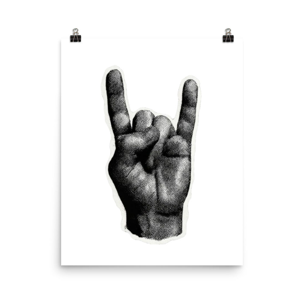Black and white illustration of a hand making a rock-on gesture on a white background