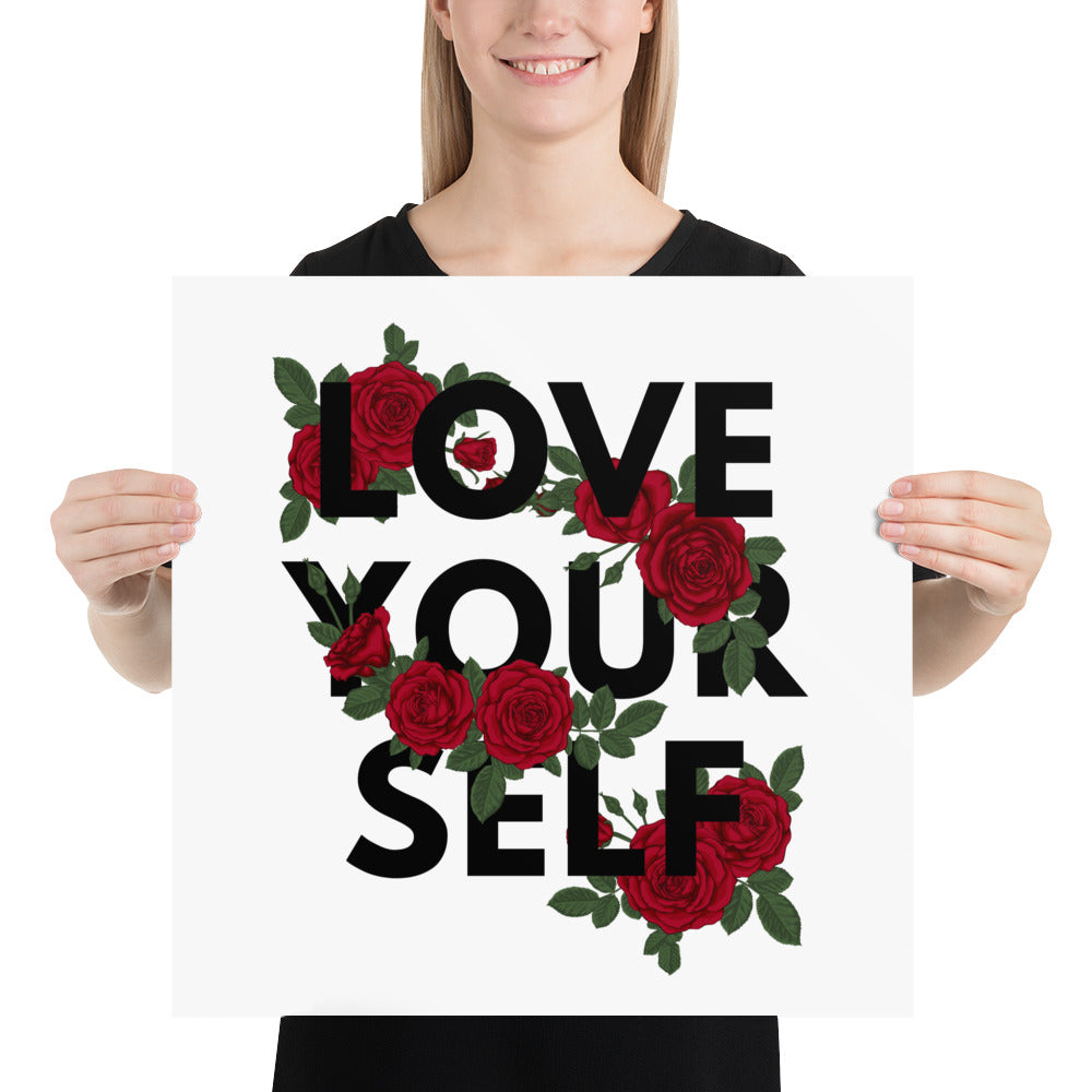 Person holding a poster with 'Love Your Self' text and red roses.