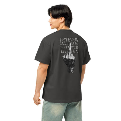 Person wearing a black t-shirt with a logo on the back, standing against a white background