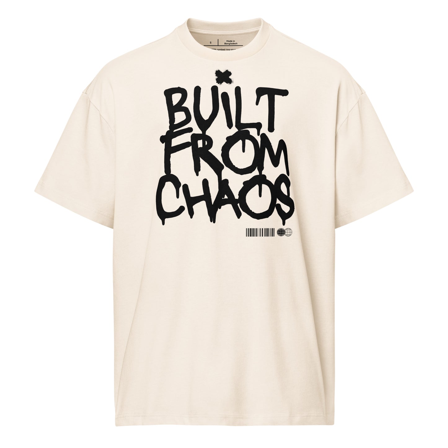 Beige t-shirt with 'Built from Chaos' text on a white background