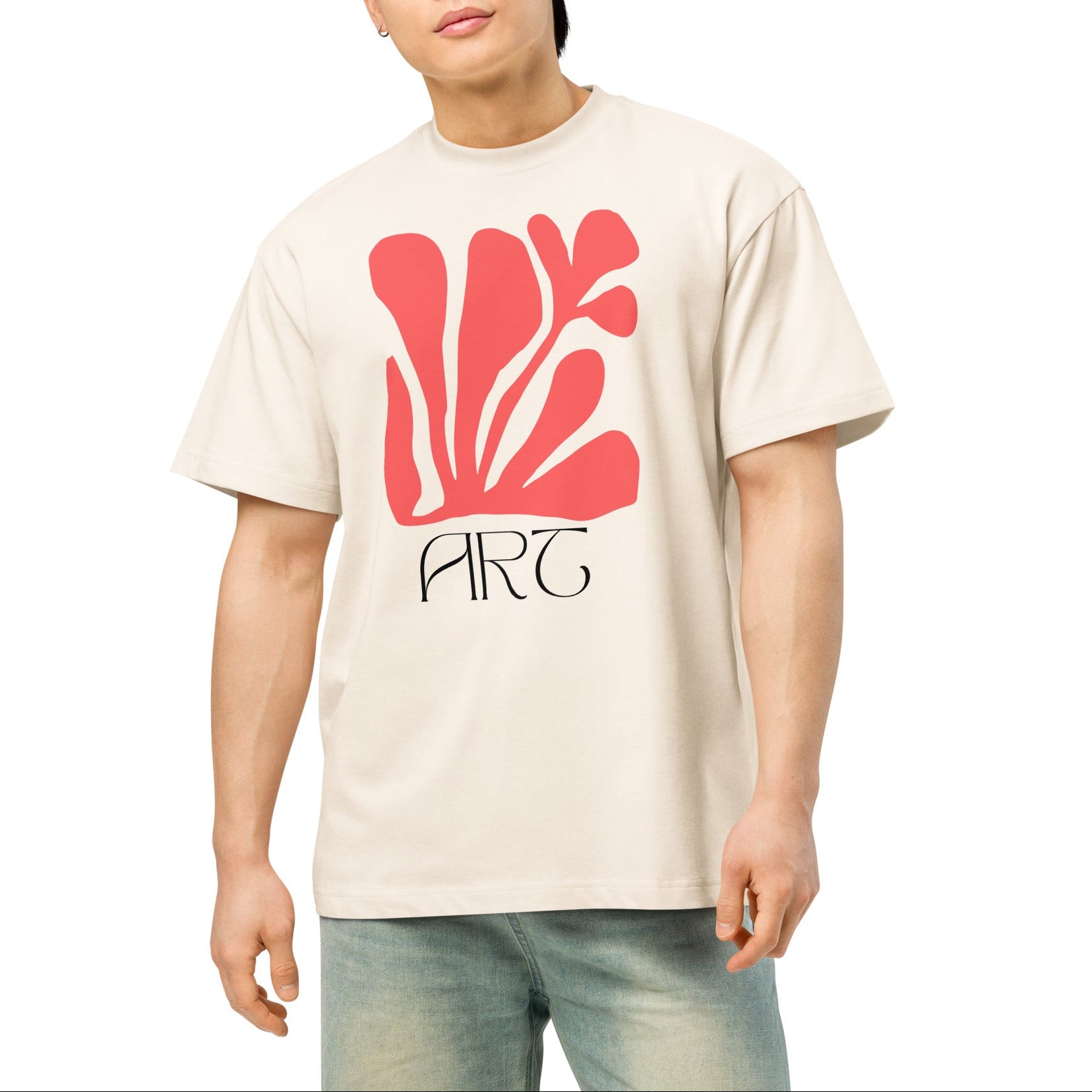 Person wearing a beige t-shirt with a red floral design and 'ART' text on a white background