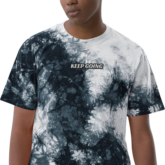 Tie-dye t-shirt with 'KEEP GOING' text on a white background
