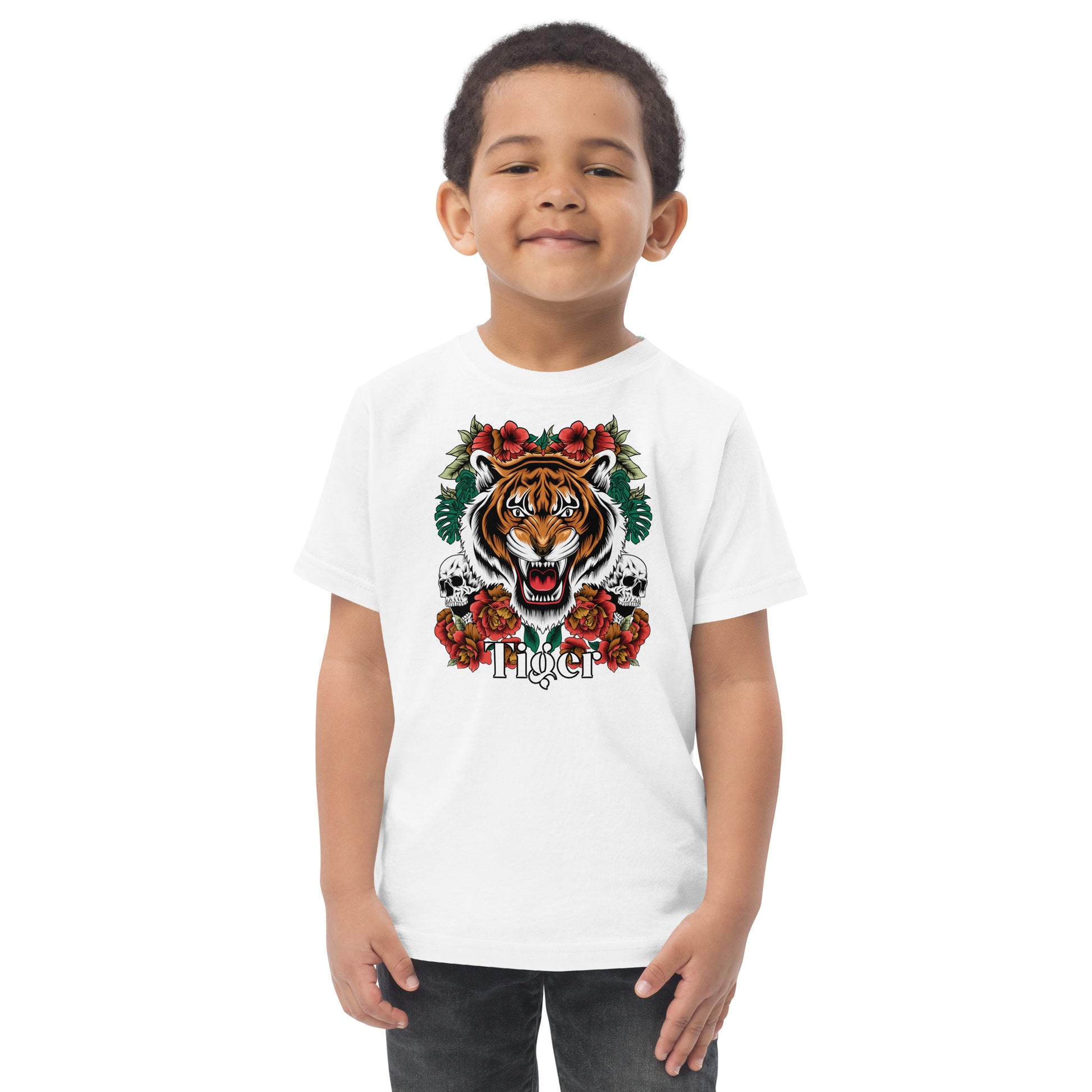 Child wearing a white t-shirt with a tiger graphic design on a white background