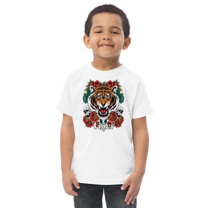 Child wearing a white t-shirt with a tiger graphic design on a white background