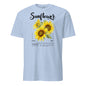 Light blue t-shirt with sunflower design and text on a white background