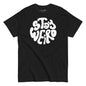 Black t-shirt with white 'Stay Weird' text on a white background