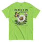 Green t-shirt with a graphic of flowers and a butterfly, featuring the text 'Beauty in Simplicity'.