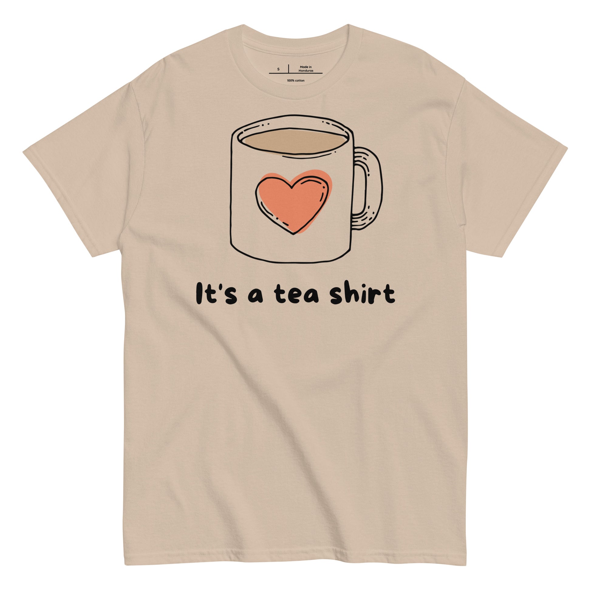 Beige t-shirt with a graphic of a coffee mug with a heart and text 'It's a tea shirt' on a white background