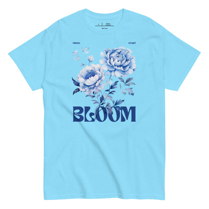 Light blue t-shirt with floral design and 'BLOOM' text on a white background