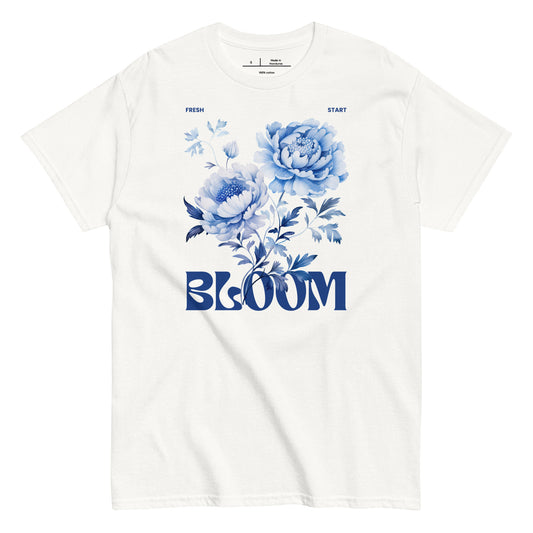 White t-shirt with blue floral design and 'BLOOM' text on a white background