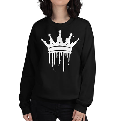Person wearing a black sweatshirt with a white crown graphic on a white background