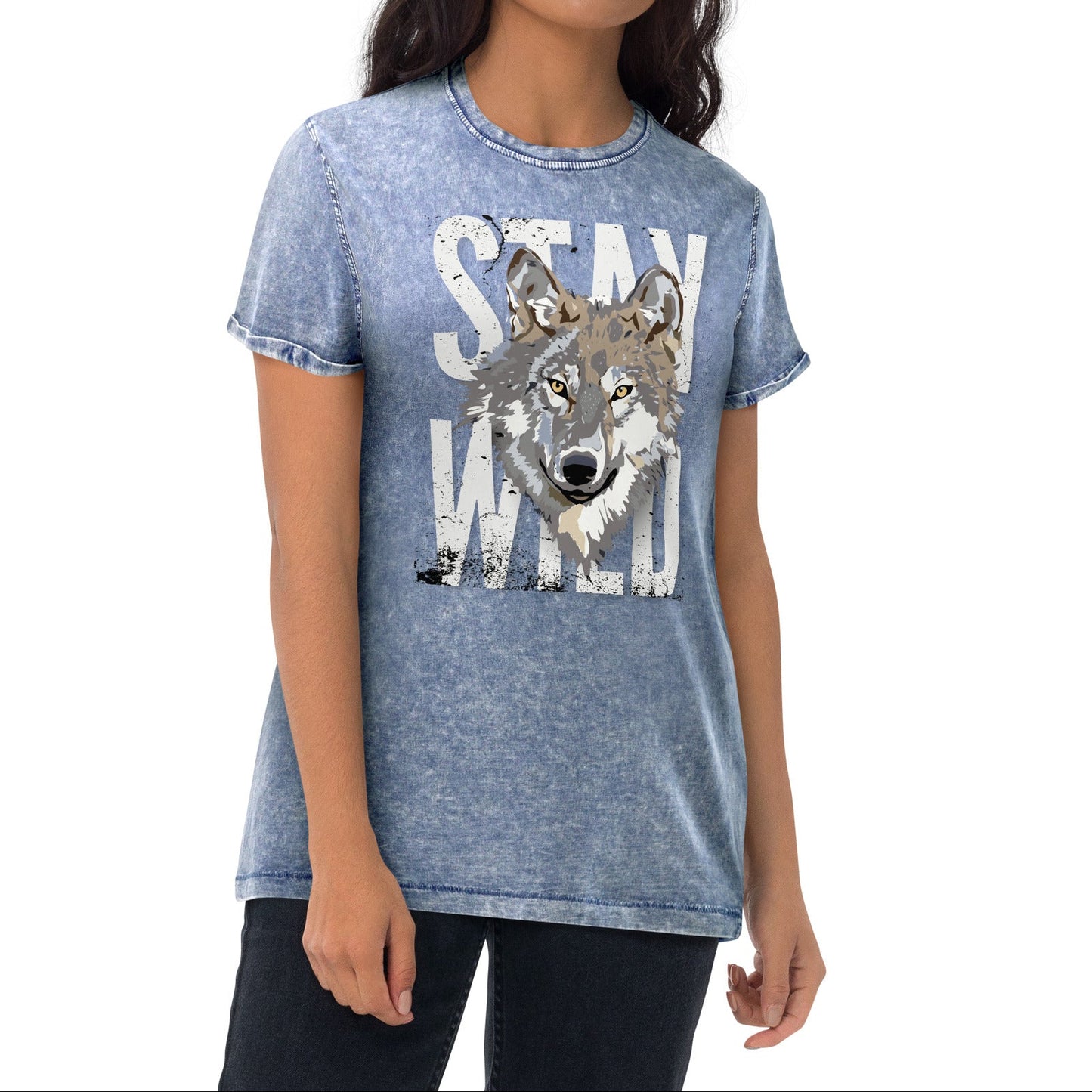 Woman wearing a blue t-shirt with a graphic design on a white background