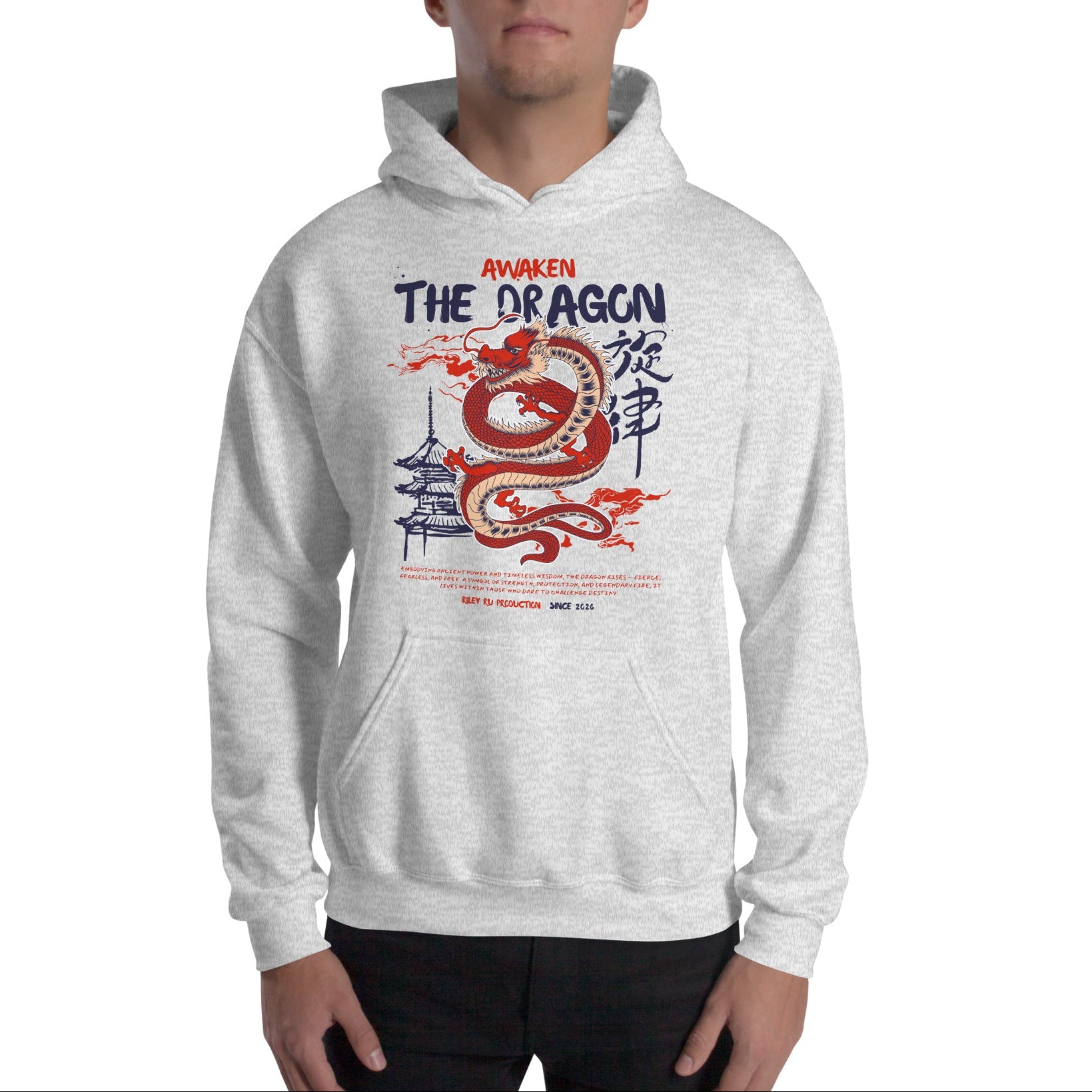 Person wearing a gray hoodie with a dragon design and text on a white background