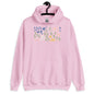 Pink hoodie with floral design on a hanger against a white background