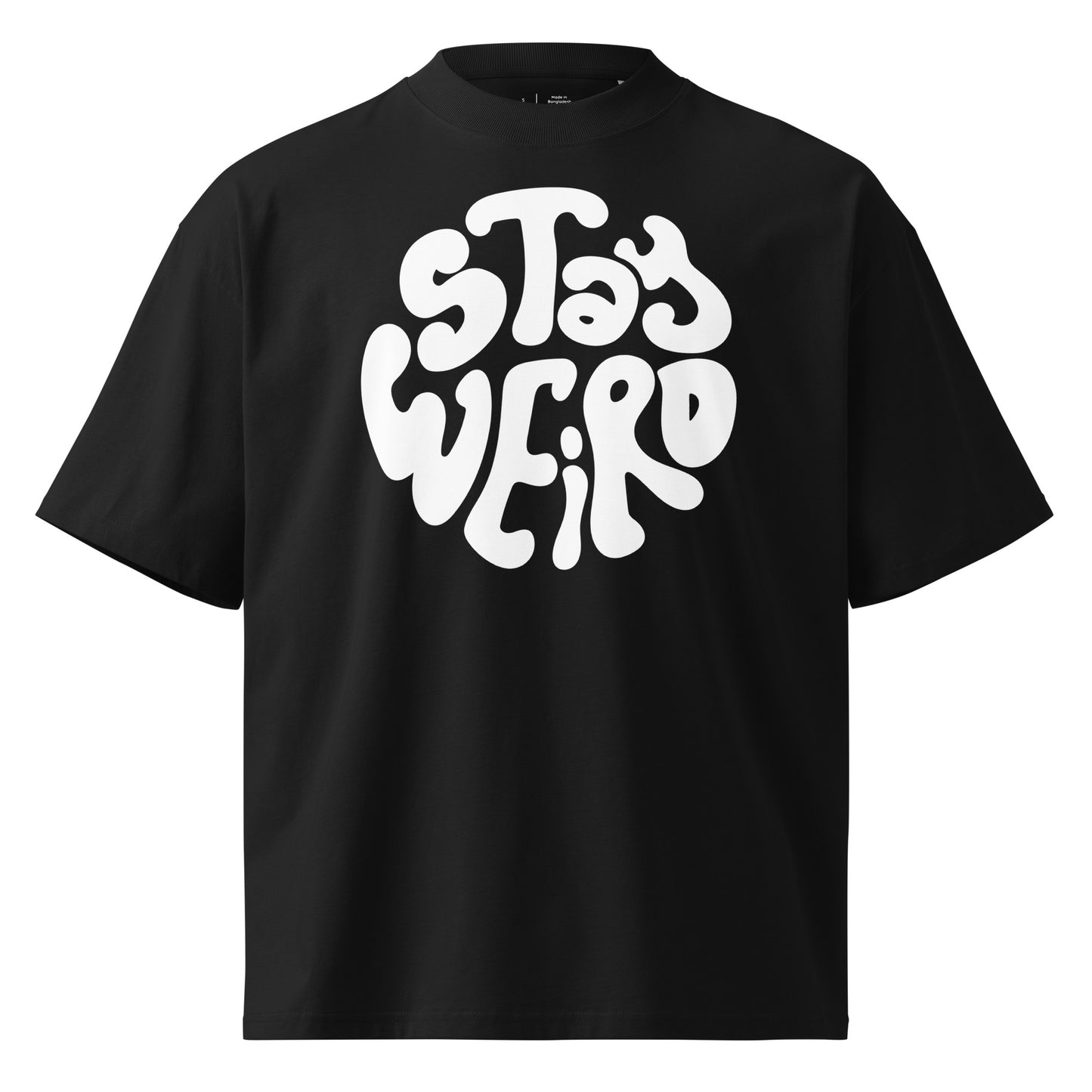 Black t-shirt with 'Stay Weird' text on a white background