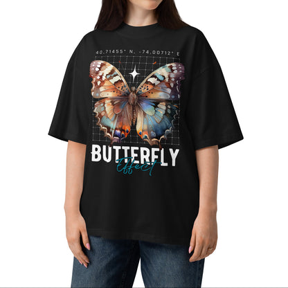 Woman wearing a black t-shirt with a butterfly design and text on a white background