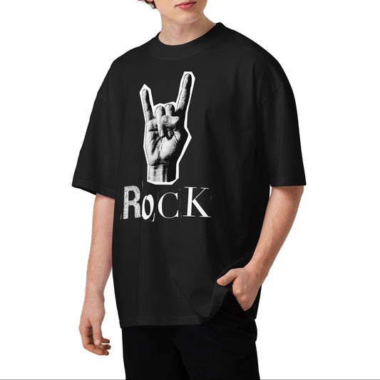 Person wearing a black t-shirt with a rock hand gesture design on a white background