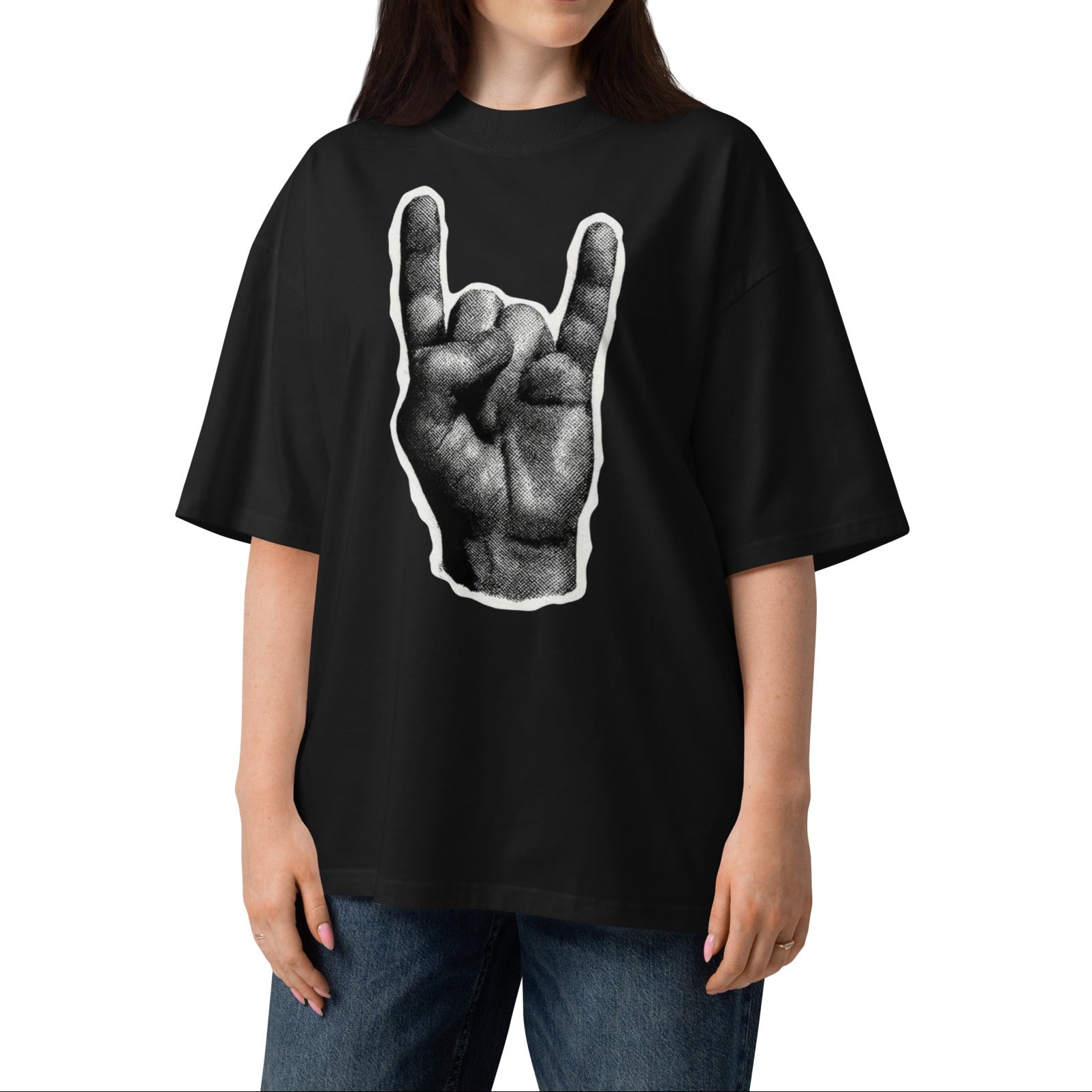 Person wearing a black t-shirt with a graphic design on a white background