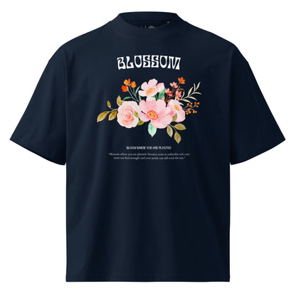 Navy blue t-shirt with floral design and text on a white background