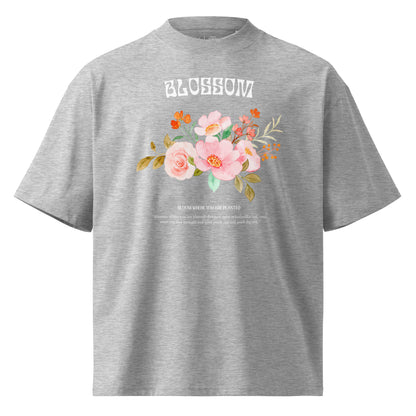 Gray t-shirt with floral design and 'Blossom' text on a white background