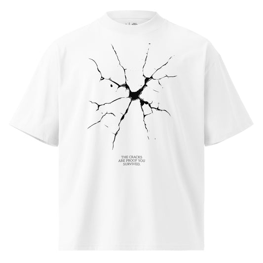 White t-shirt with black cracked design and text on a white background