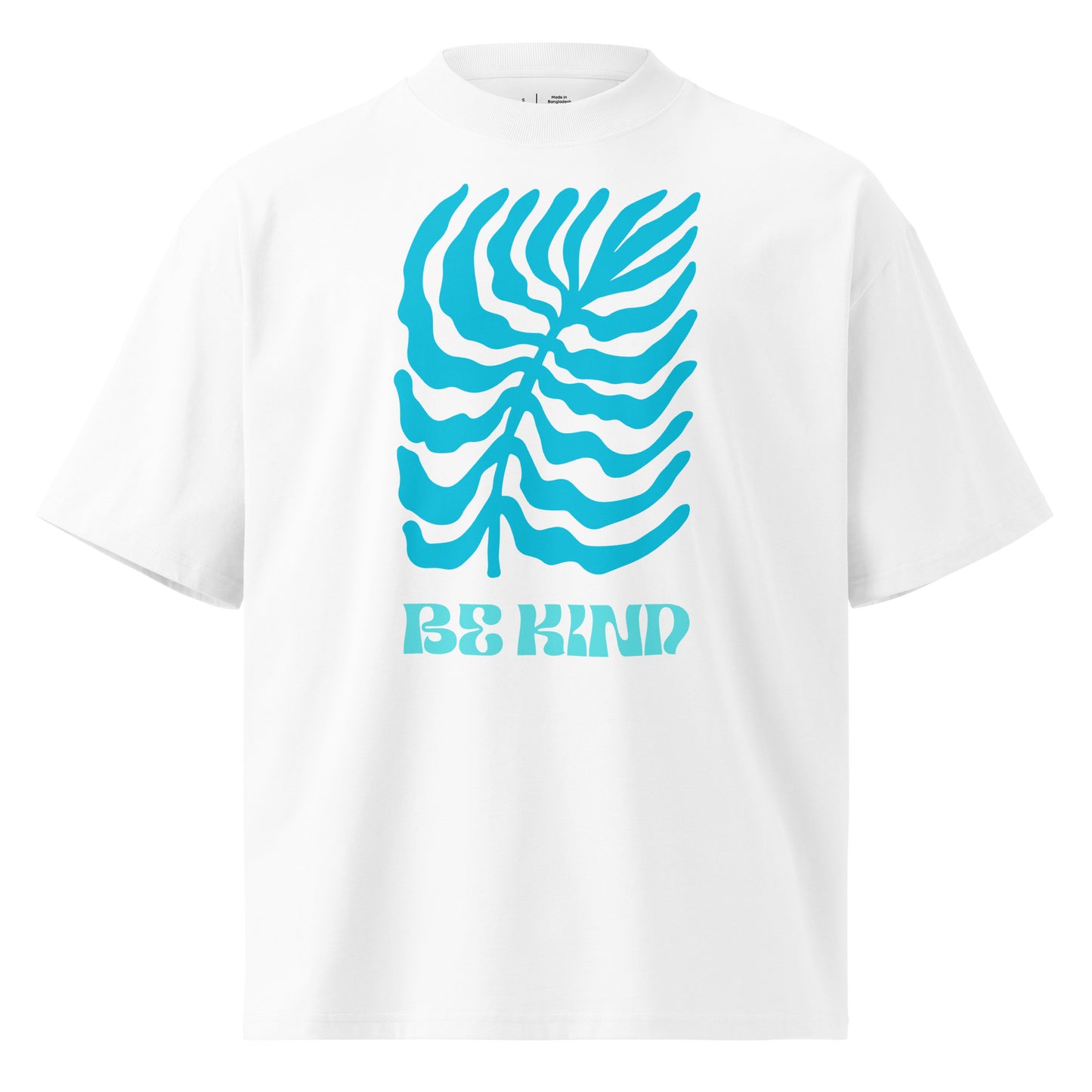 White t-shirt with blue graphic design and 'Be Kind' text on a white background