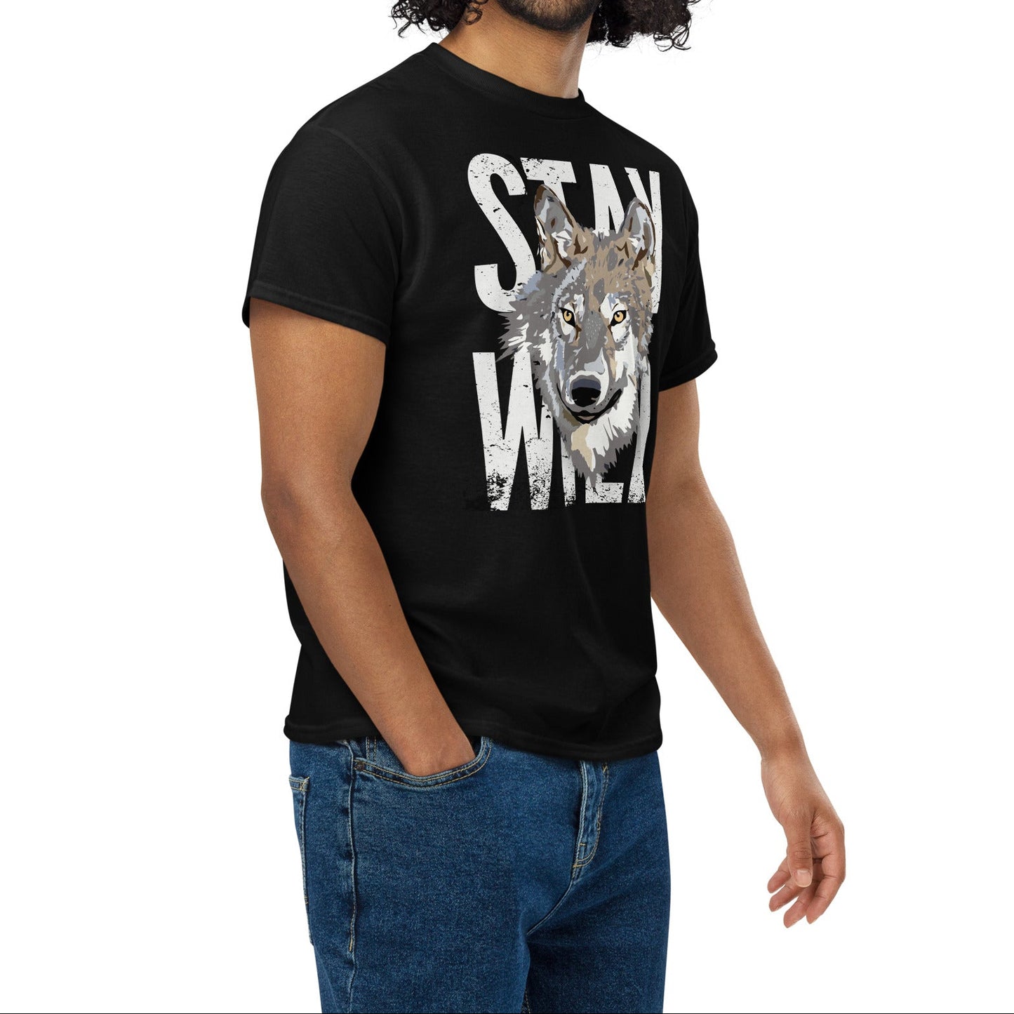 Man wearing a black t-shirt with a wolf graphic and 'Stay Wild' text on a white background